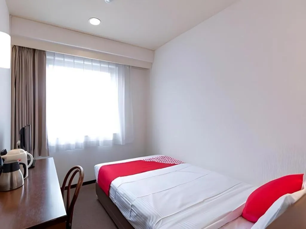 Bed in Tabist Yabuki Station Hotel