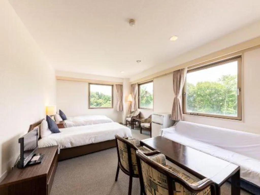 Bed in Tabist Yabuki Station Hotel