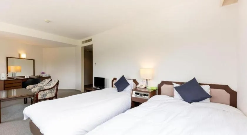 Bed in Tabist Yabuki Station Hotel