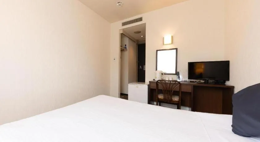 Bed in Tabist Yabuki Station Hotel