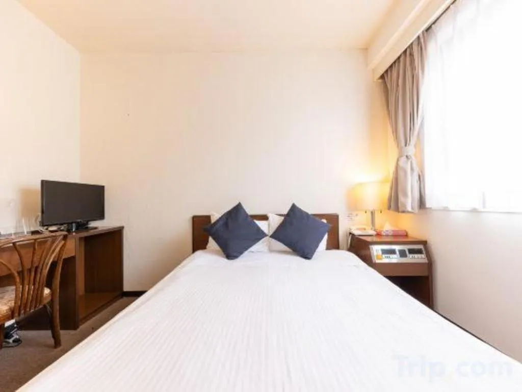 Bed in Tabist Yabuki Station Hotel