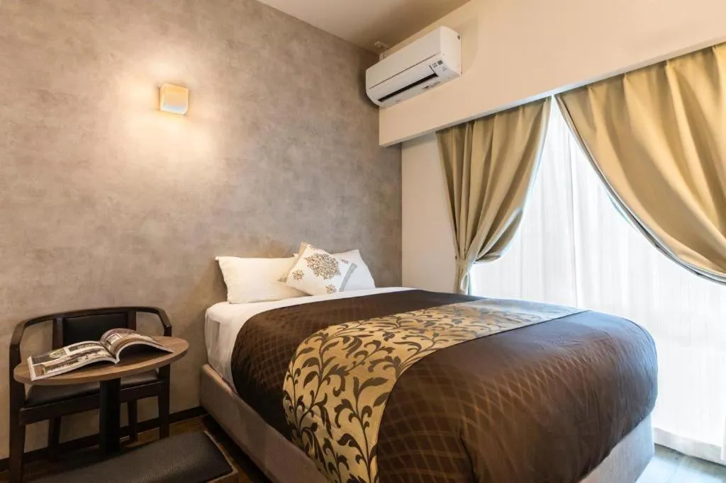 Bed in Mr.KINJO in NAHA