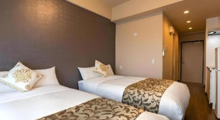 Bed in Mr.KINJO LINK in KUME NAHA