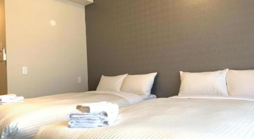 Bed in Mr.KINJO LINK in KUME NAHA