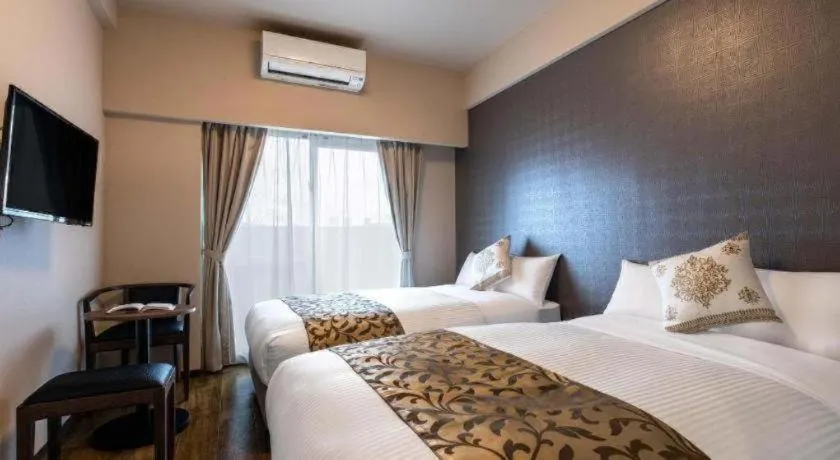 Bed in Mr.KINJO LINK in KUME NAHA