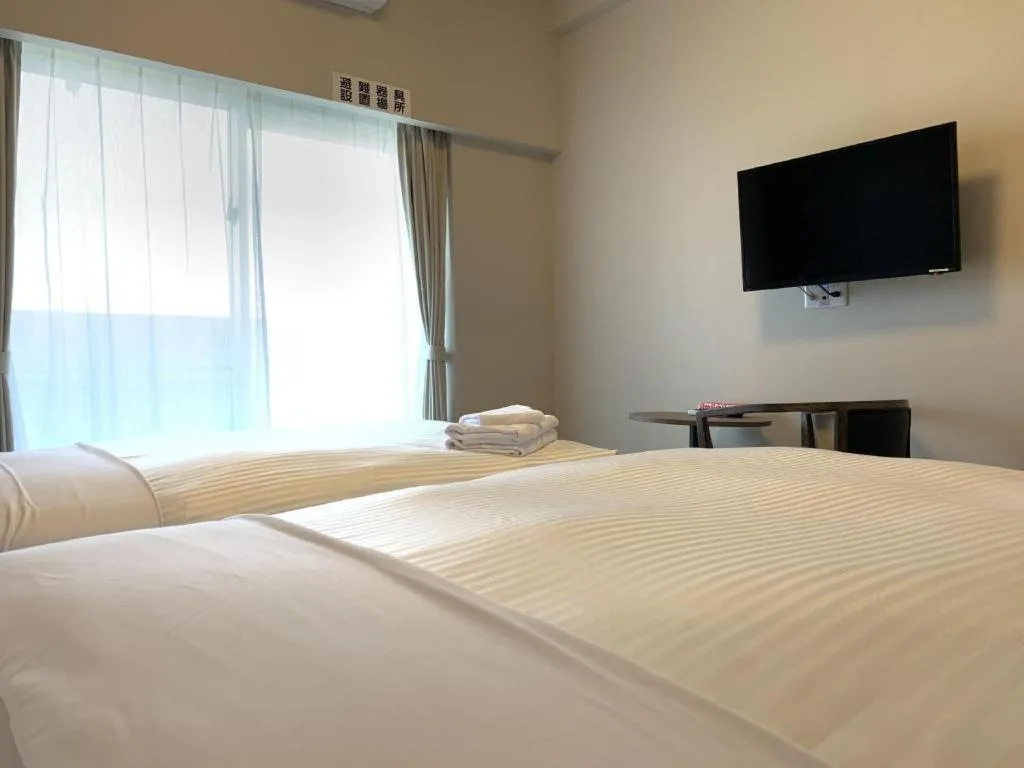 Bed in Mr.KINJO LINK in KUME NAHA