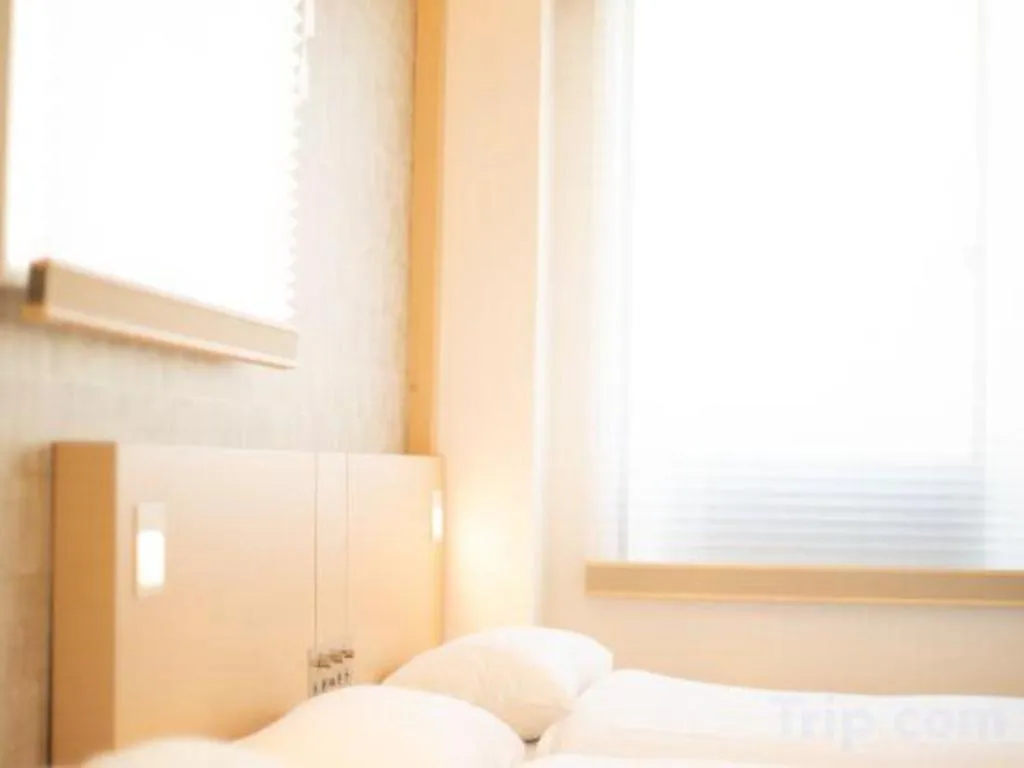 Bed in NAMBA EBISU HOTEL