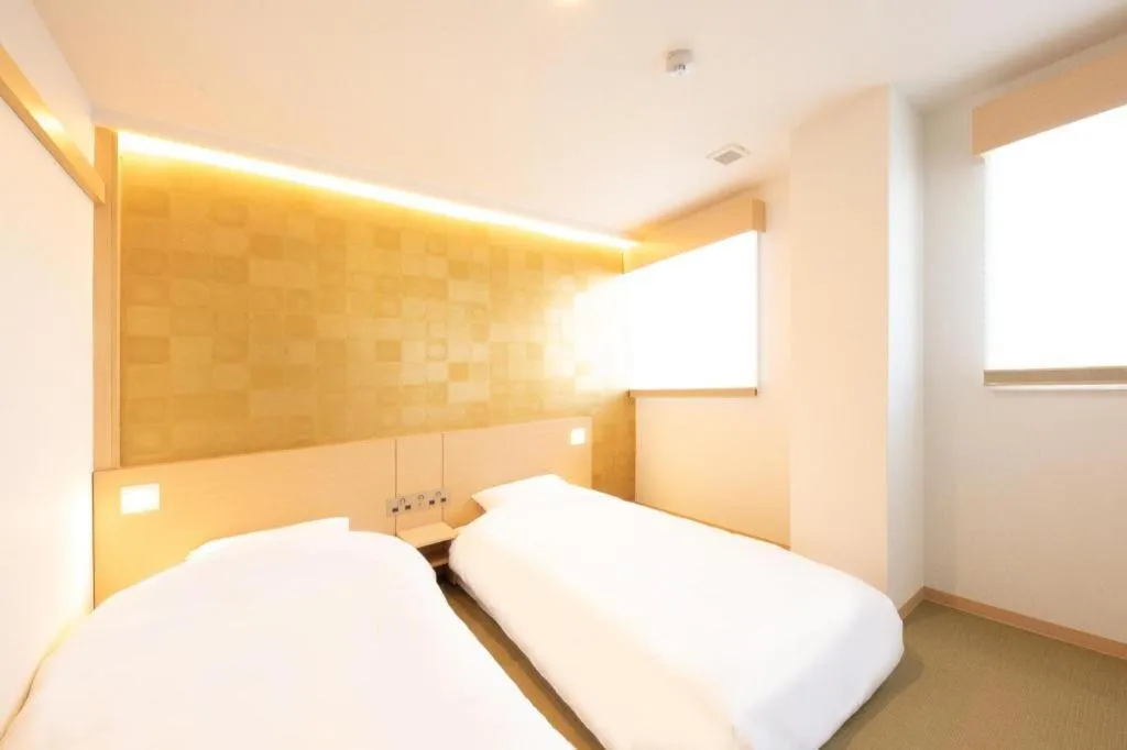 Bed in NAMBA EBISU HOTEL