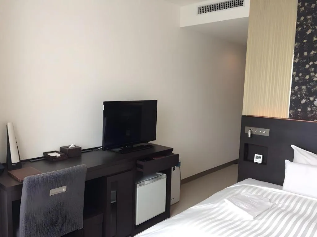 Bed in JR-EAST HOTEL METS NAGAOKA