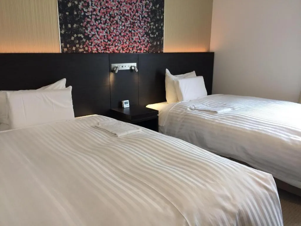 Bed in JR-EAST HOTEL METS NAGAOKA