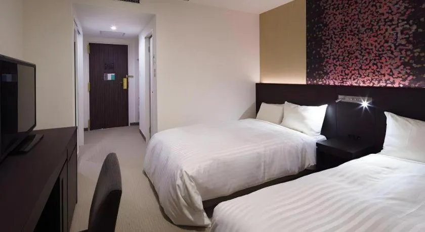 Bed in JR-EAST HOTEL METS NAGAOKA