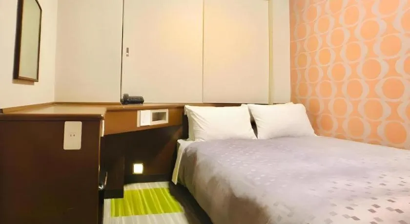 Bed in Urban Place Inn Kokura