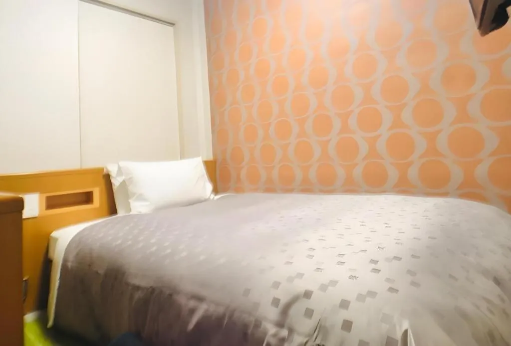 Bed in Urban Place Inn Kokura