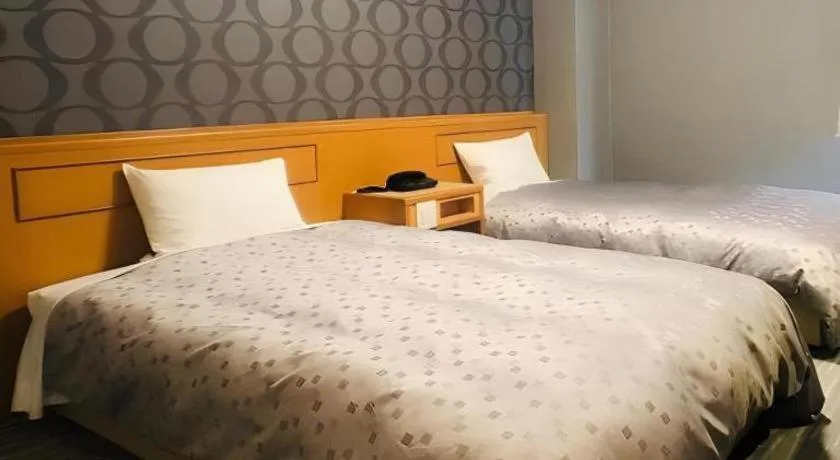 Bed in Urban Place Inn Kokura