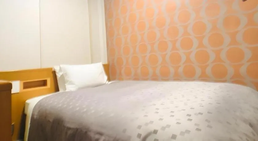 Bed in Urban Place Inn Kokura