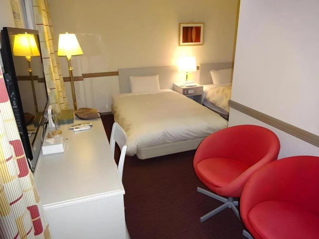 Bed in Matsumoto Wellton Hotel