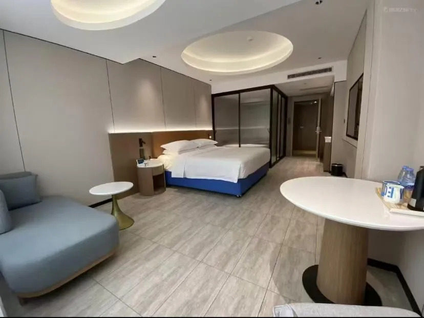 Living room, Bed in Echarm Hotel - Foshan Sanshui Wanda Plaza