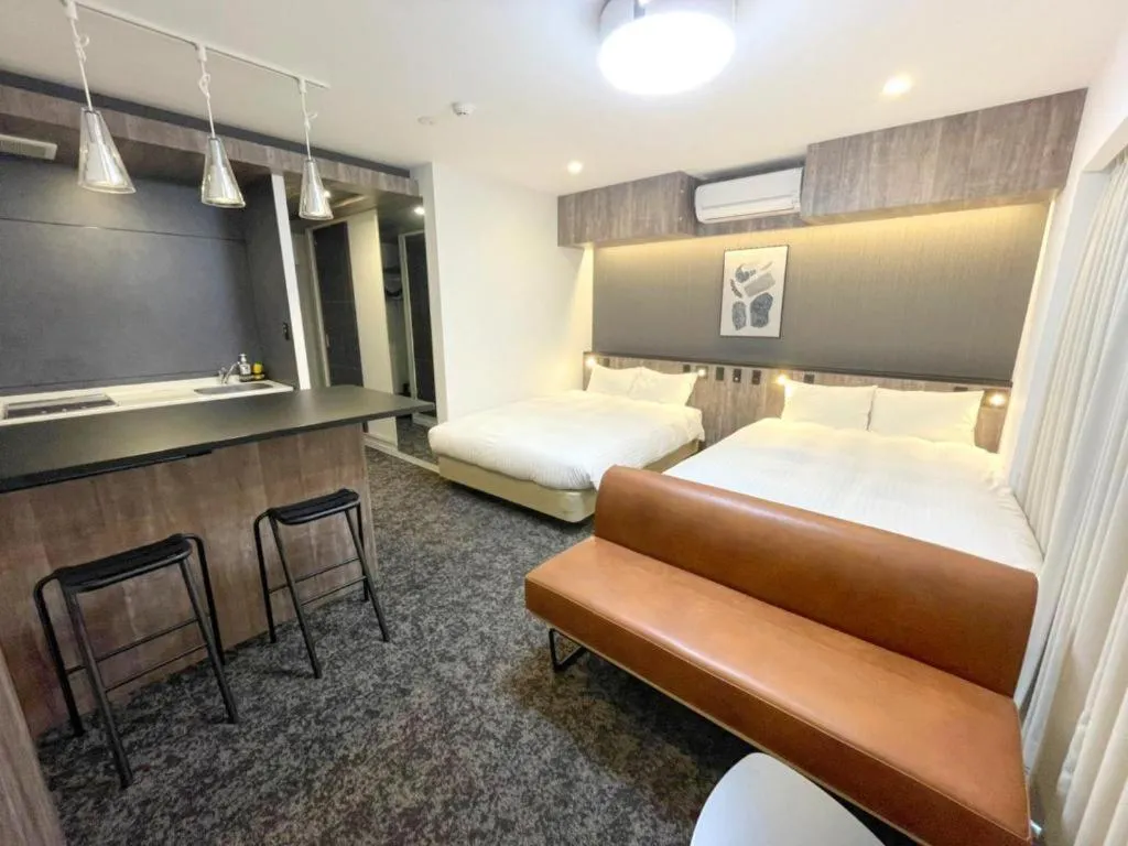 Bed in Grand STAY Hakata Station North