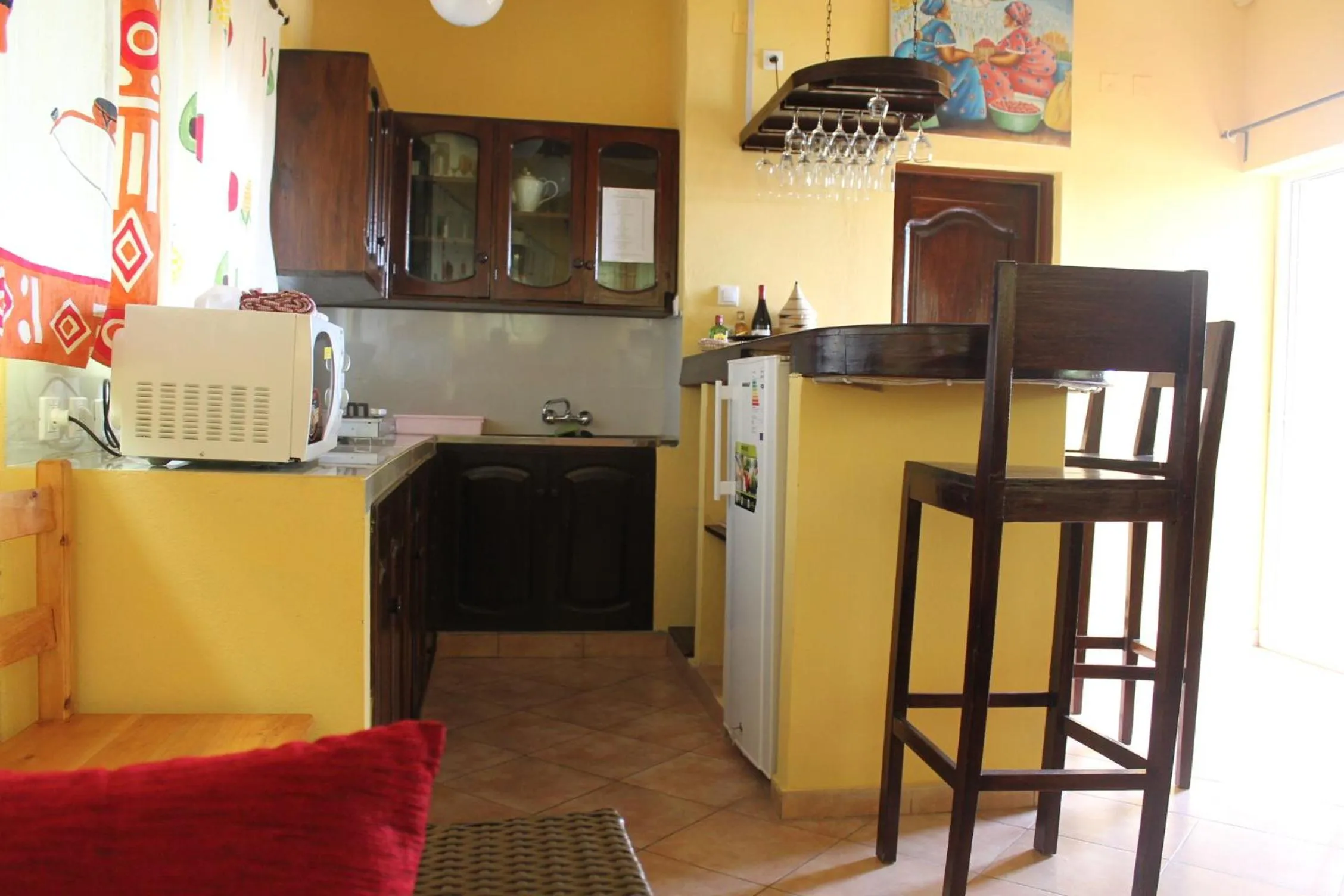 Kitchen or kitchenette in Aparthotel Jardin Tropical