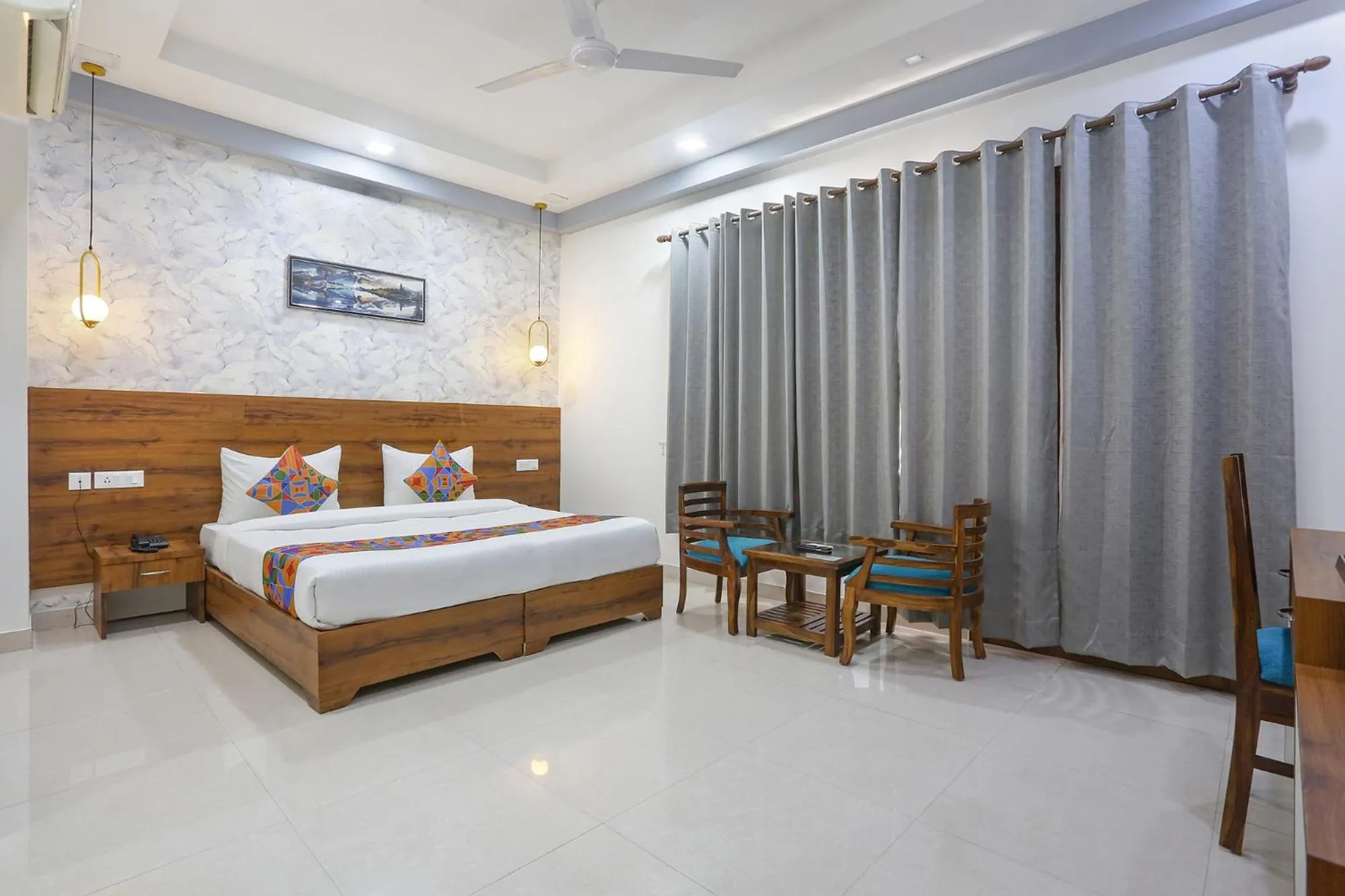 Bed in FabHotel New Journey Hospitality Near MG Road & Sikanderpur Metro