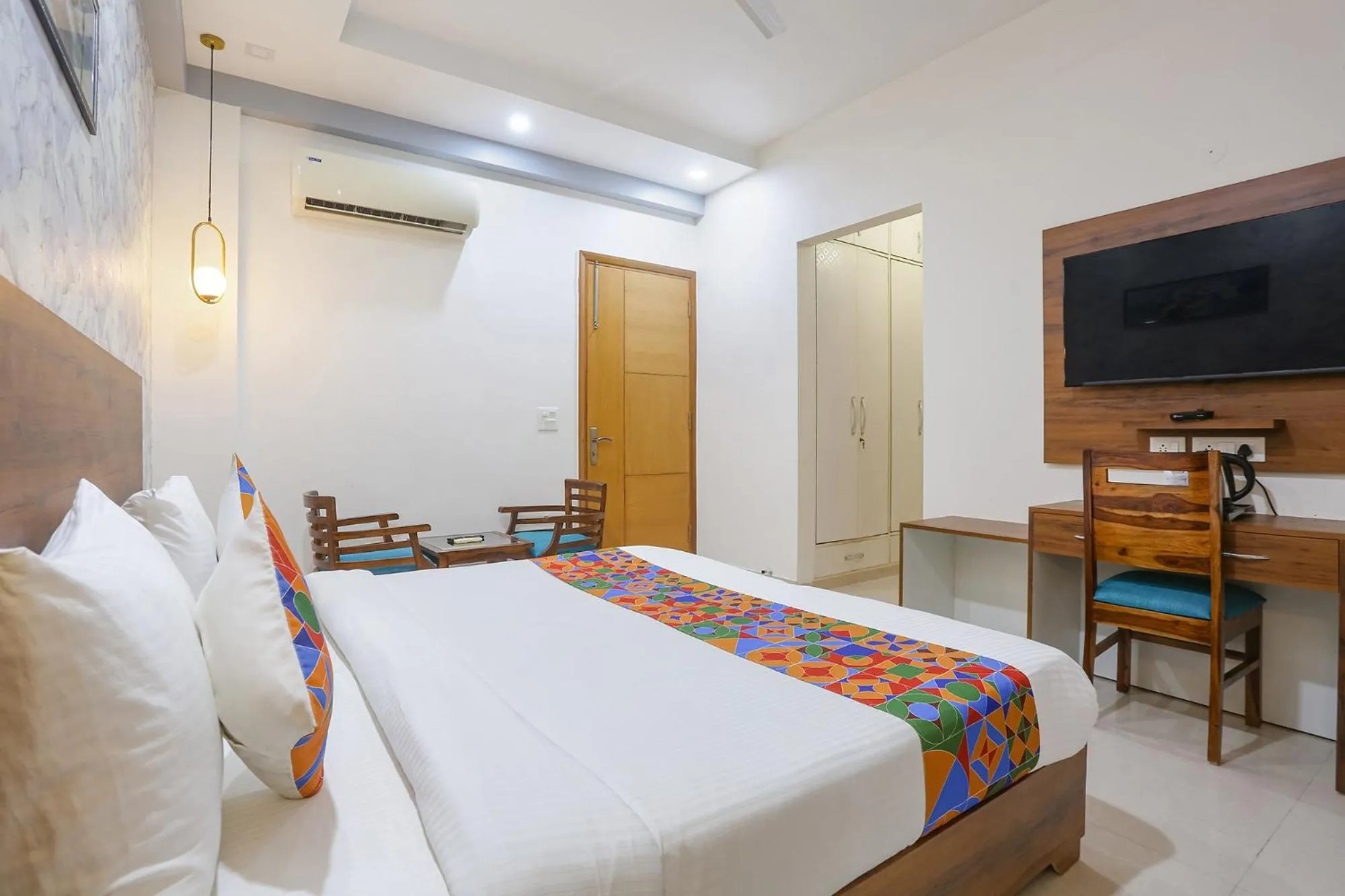 Bed in FabHotel New Journey Hospitality Near MG Road & Sikanderpur Metro