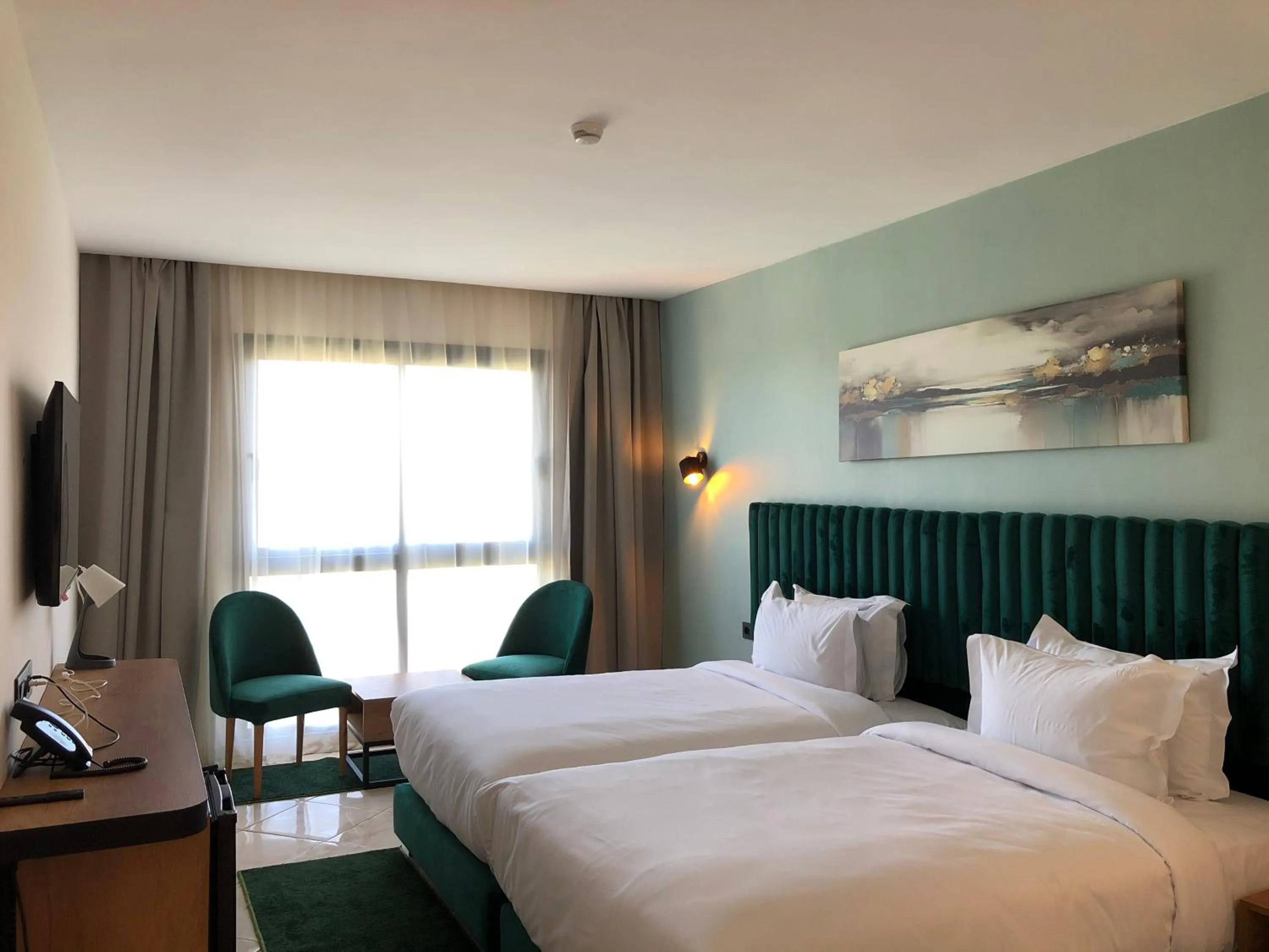 Bed in Hôtel Hariz Son