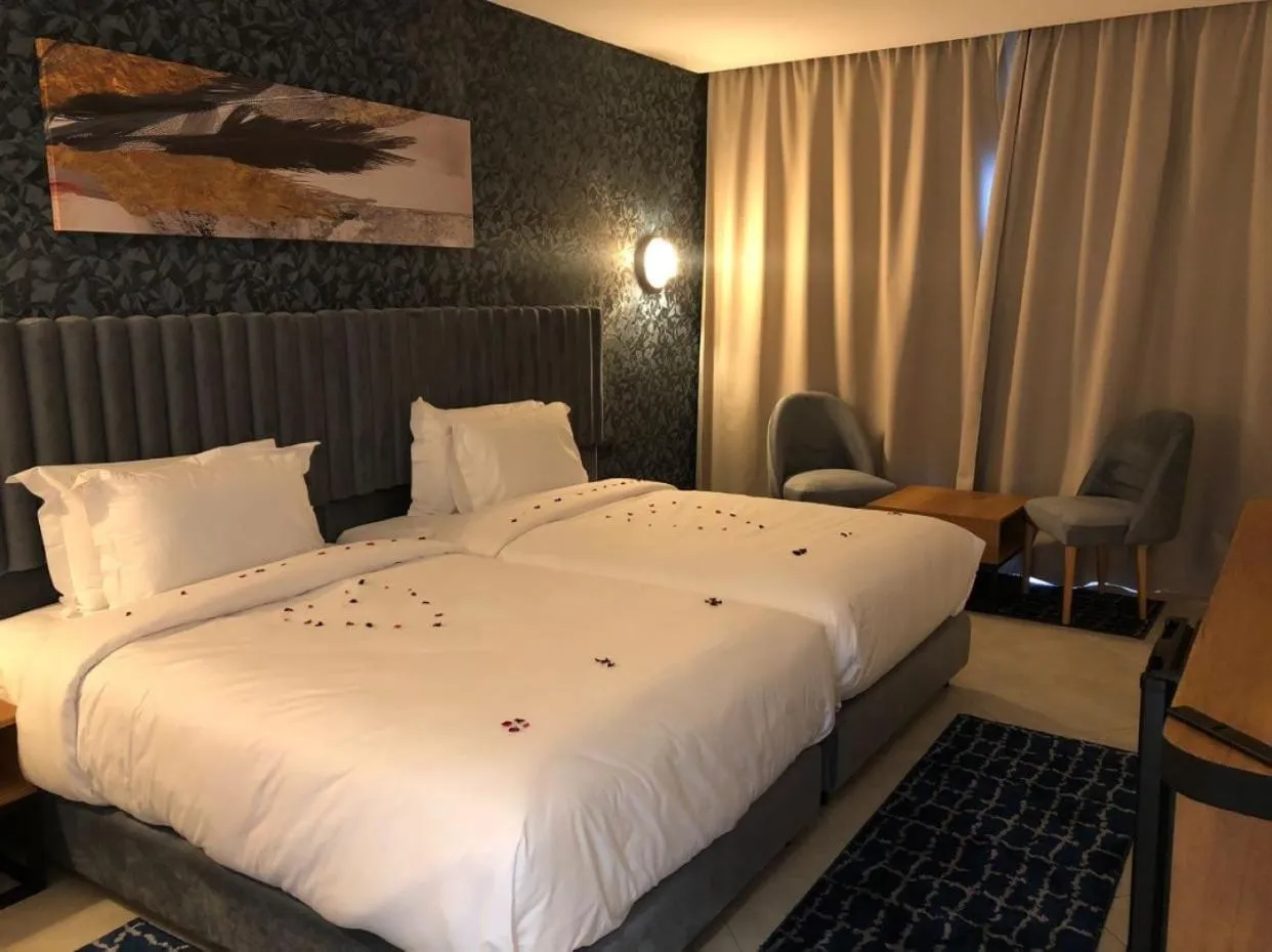 Bed in Hôtel Hariz Son