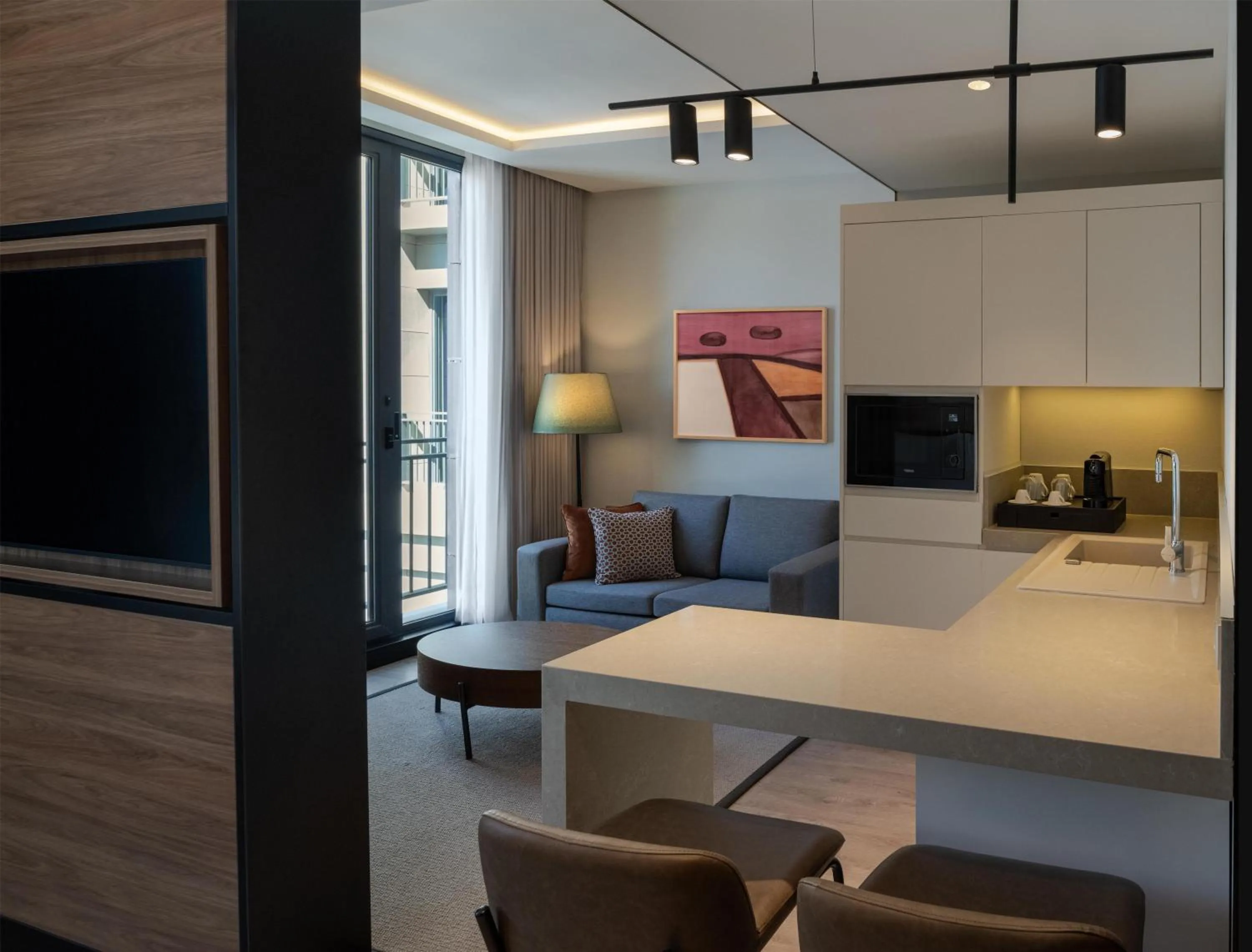 Living room, Bed in Altunizade Suites Istanbul, Curio Collection By Hilton