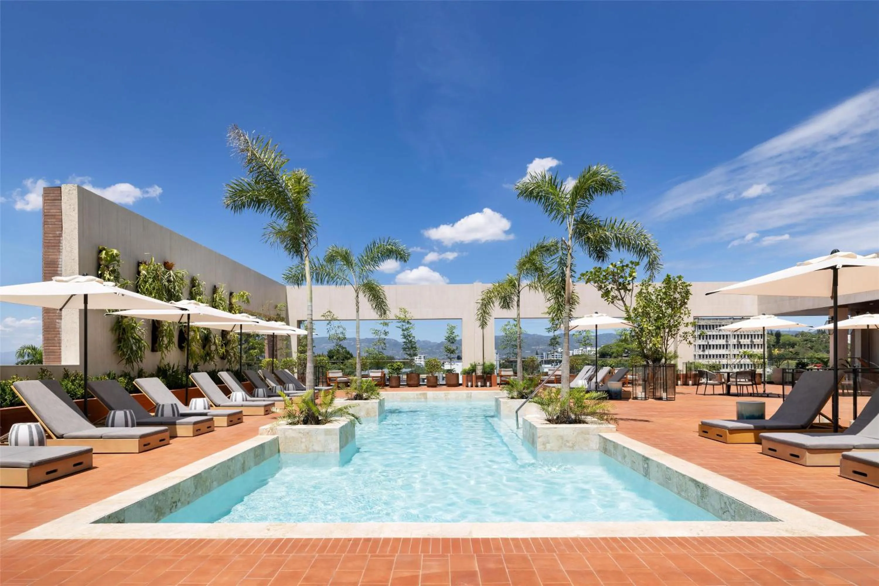 Pool view in Hotel Santiago, Curio Collection By Hilton