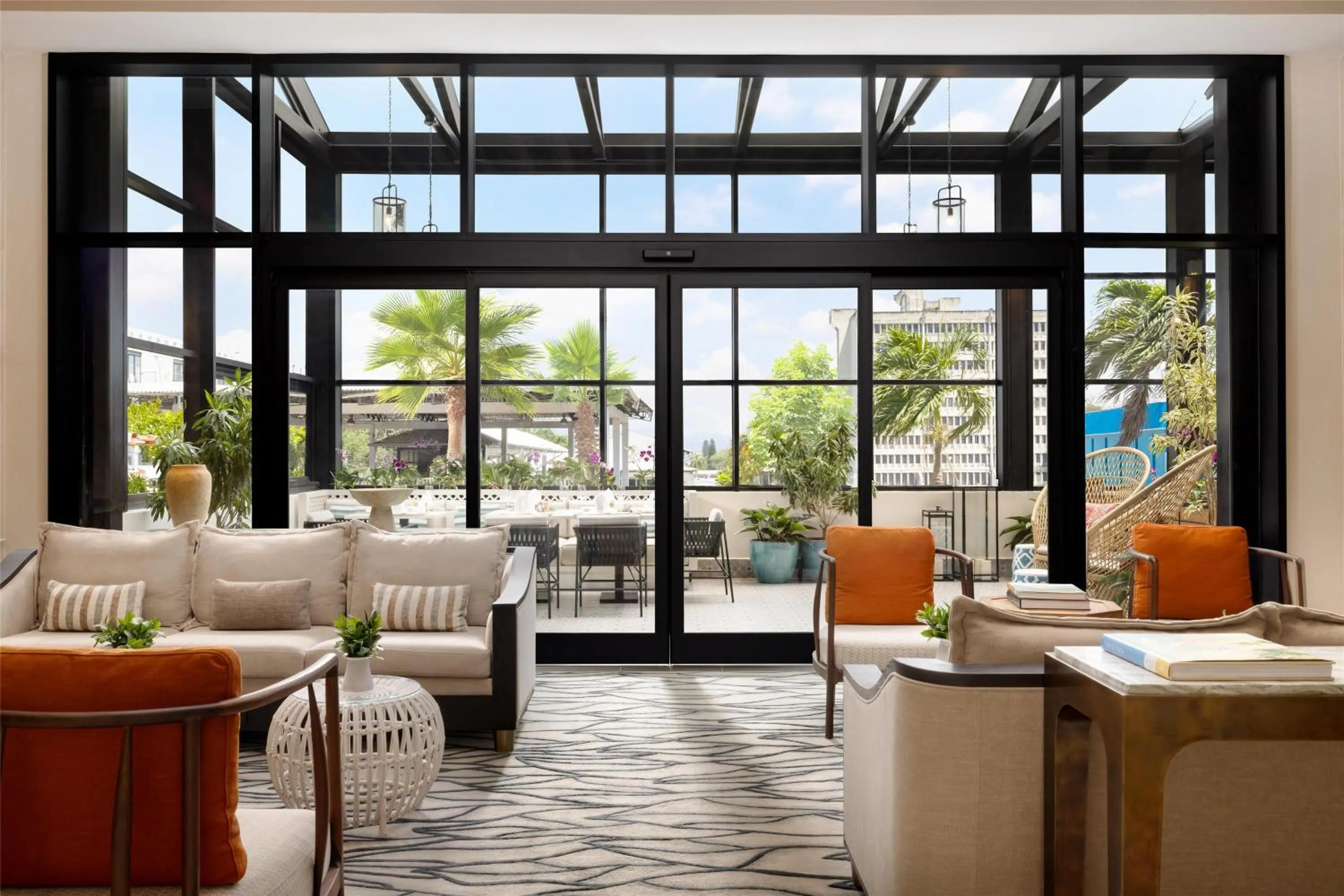 Communal lounge/ TV room in Hotel Santiago, Curio Collection By Hilton