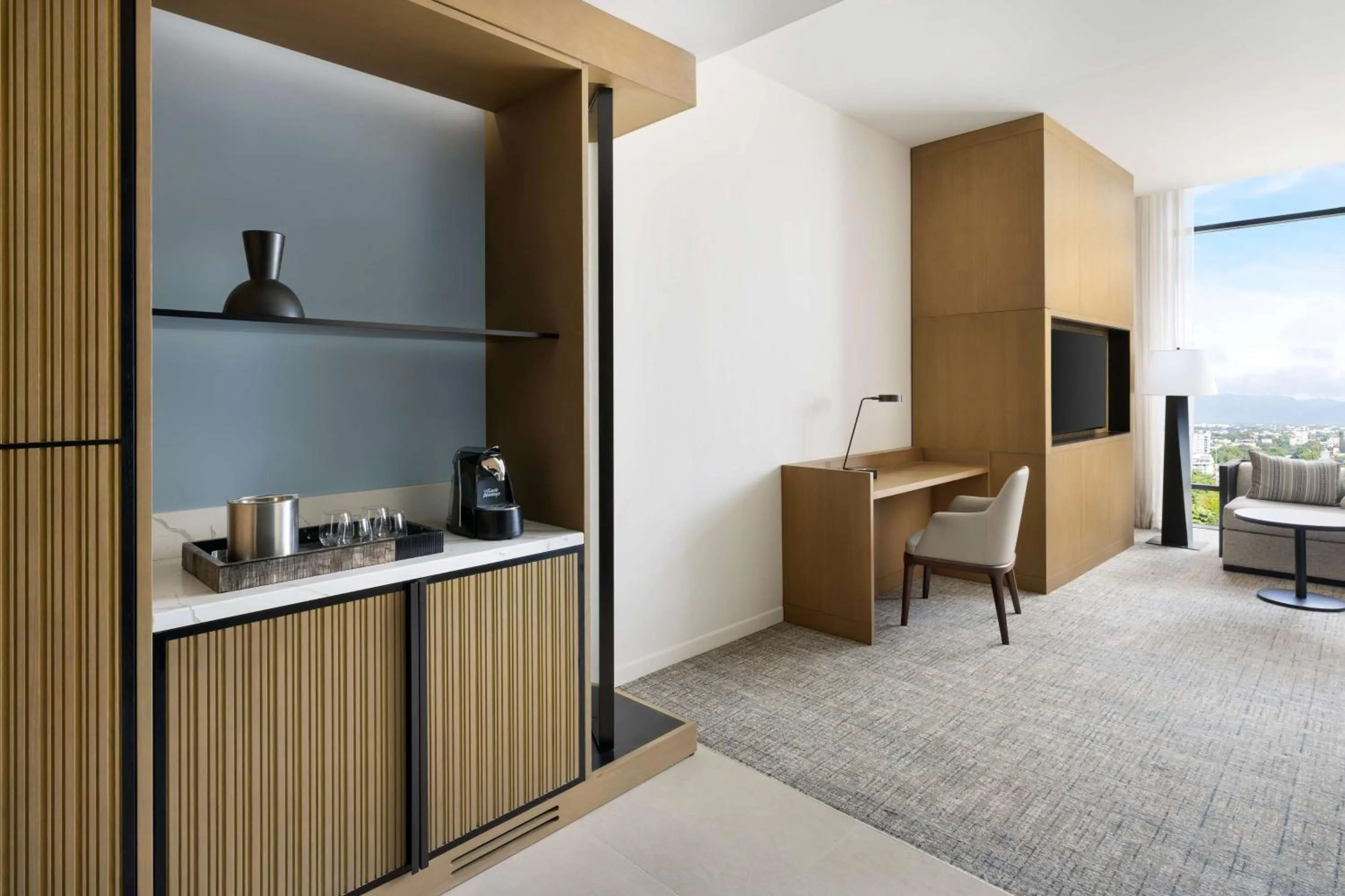 Living room in Hotel Santiago, Curio Collection By Hilton