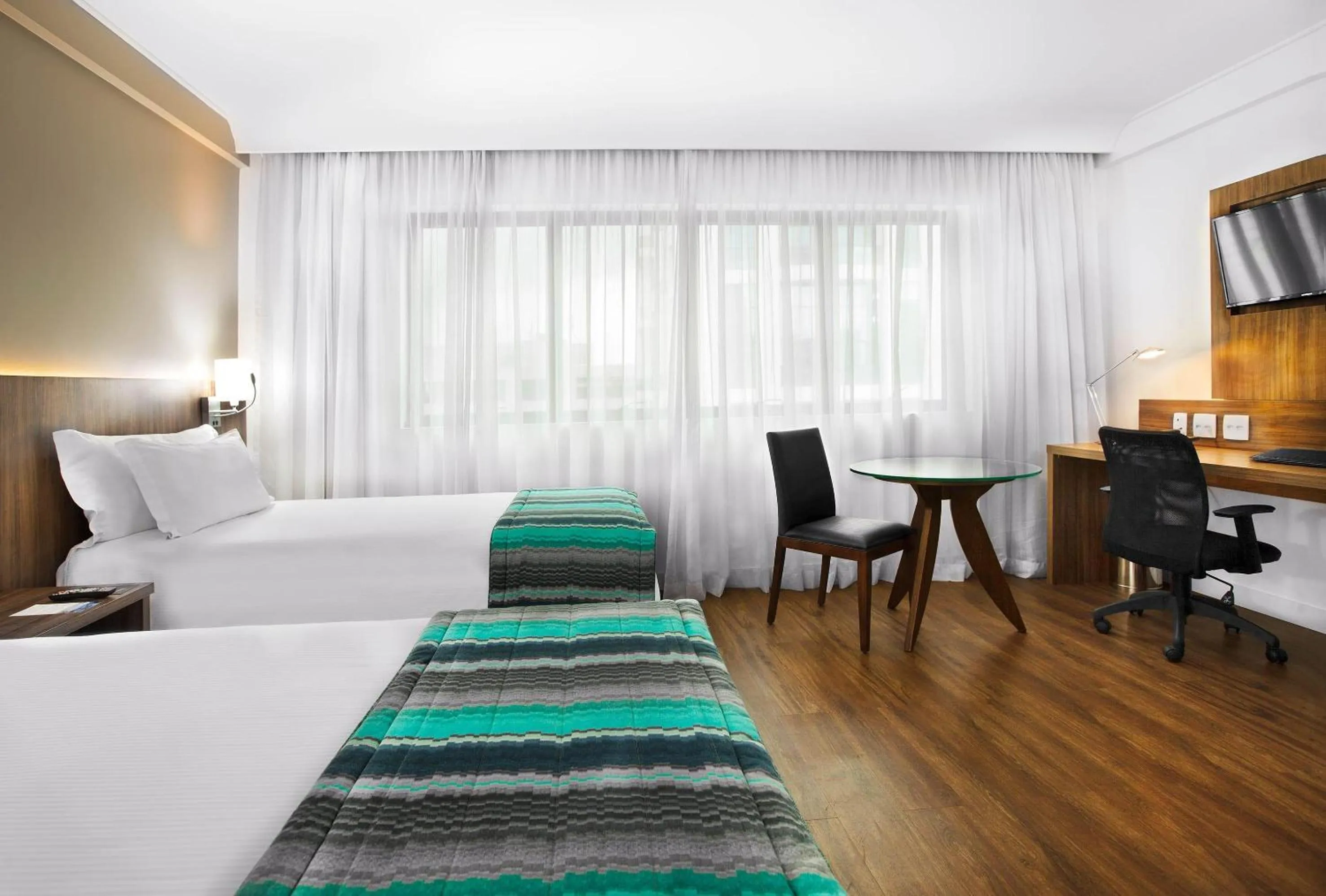 Bedroom, Bed in Meliá Ibirapuera