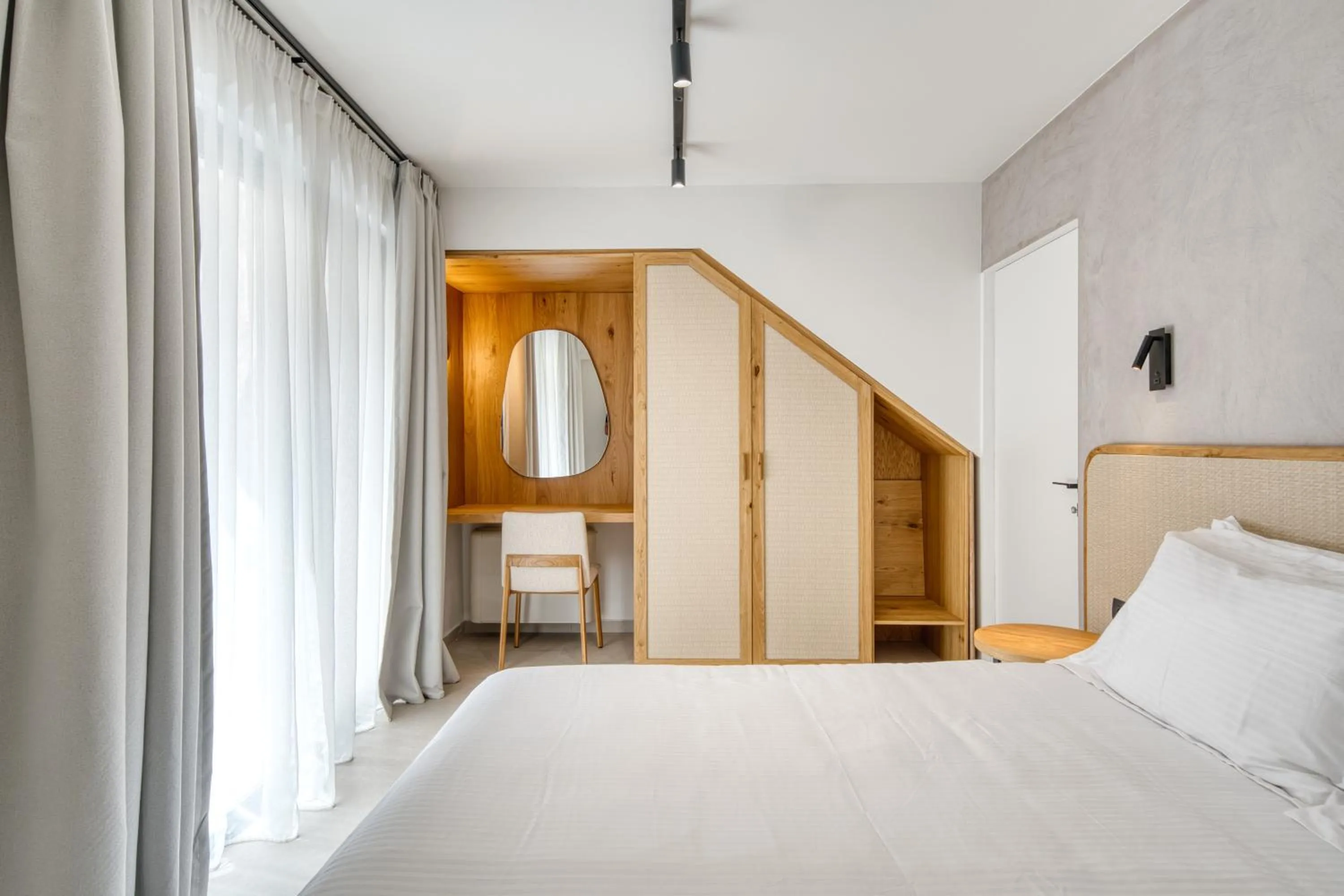 Bed in Anima Deluxe Suites