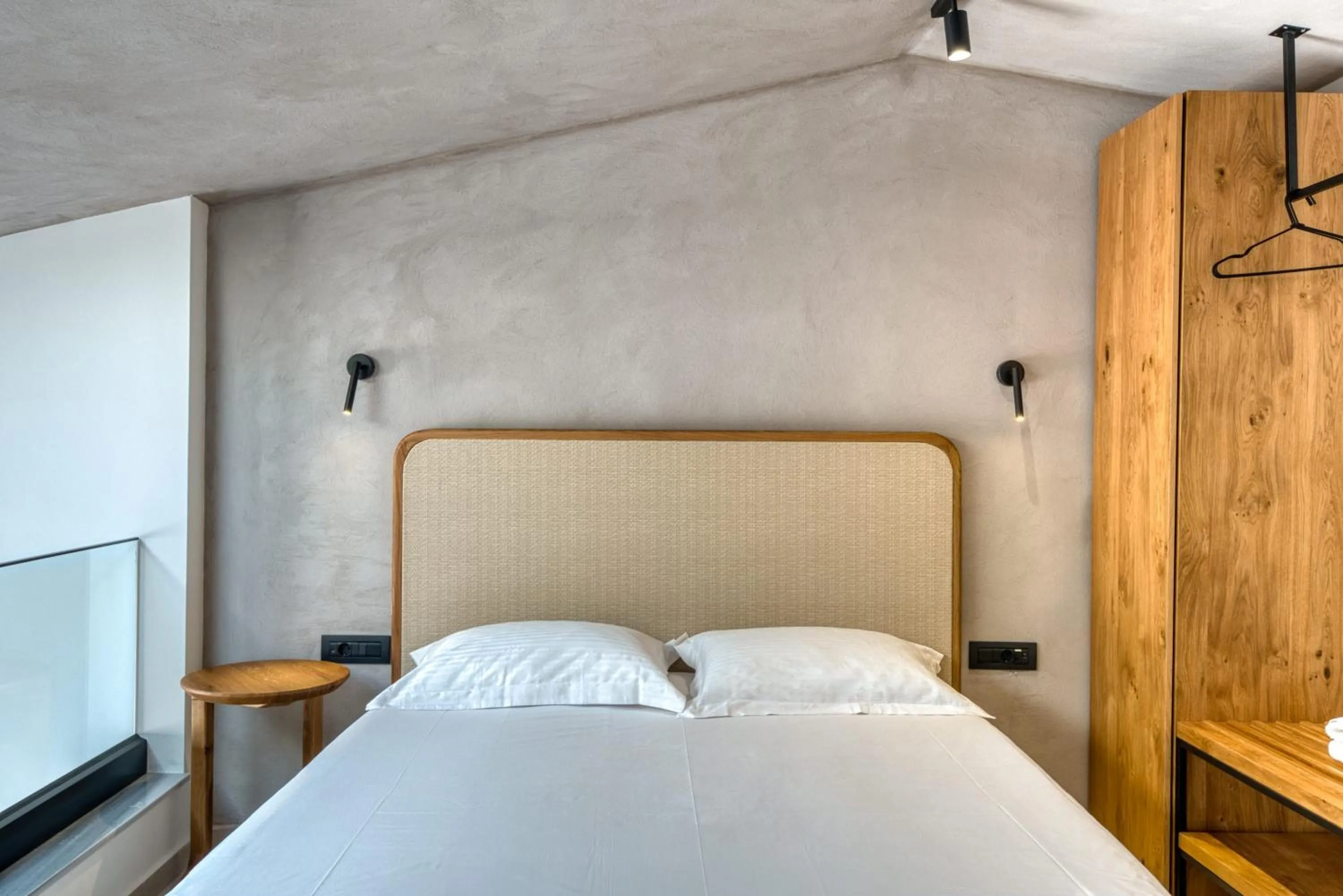 Bed in Anima Deluxe Suites