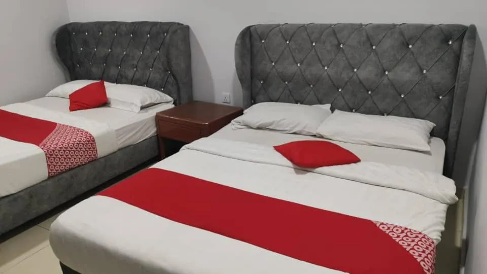 Bed in Kk INN HOTEL