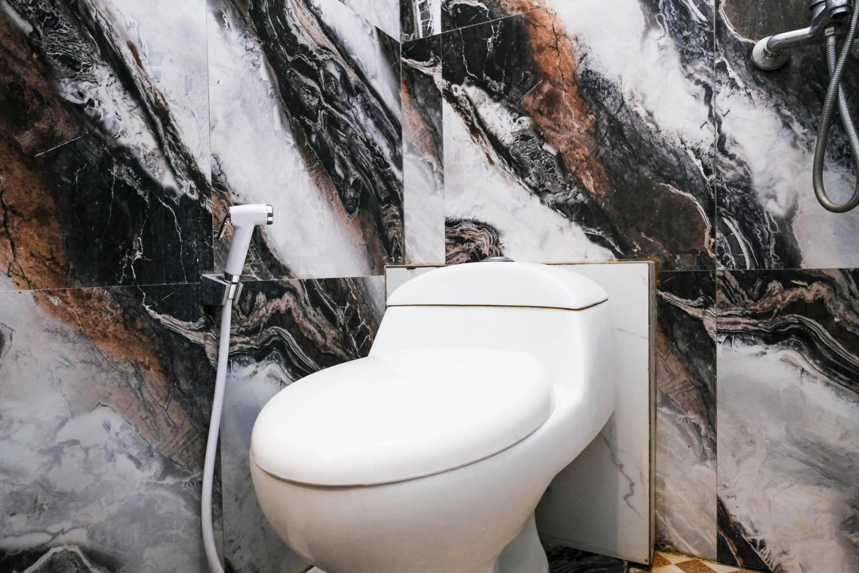 Bathroom in Urbanview Hotel Dommy Yogyakarta by RedDoorz