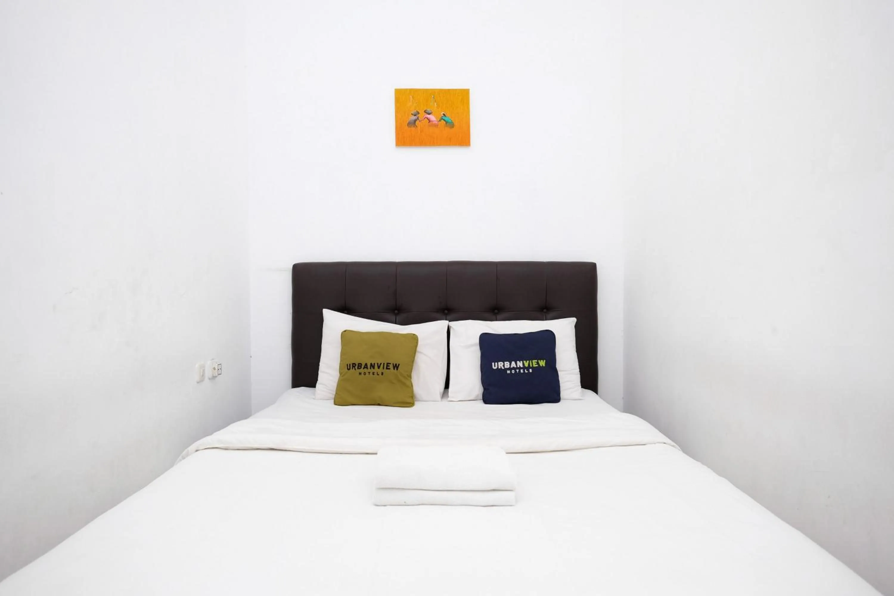 Bedroom, Bed in Urbanview Hotel Dommy Yogyakarta by RedDoorz