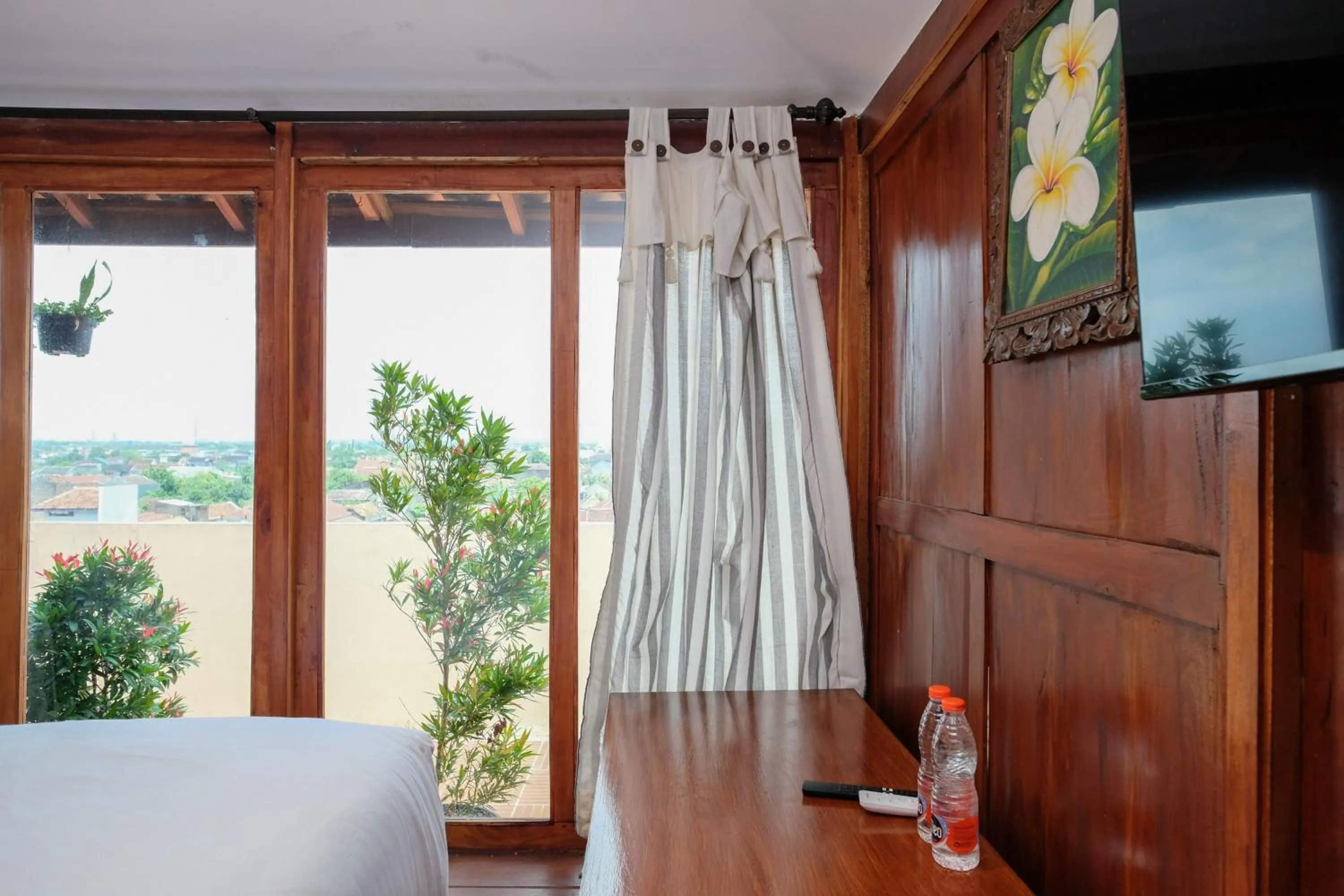 Bedroom, Bed in Urbanview Hotel Dommy Yogyakarta by RedDoorz