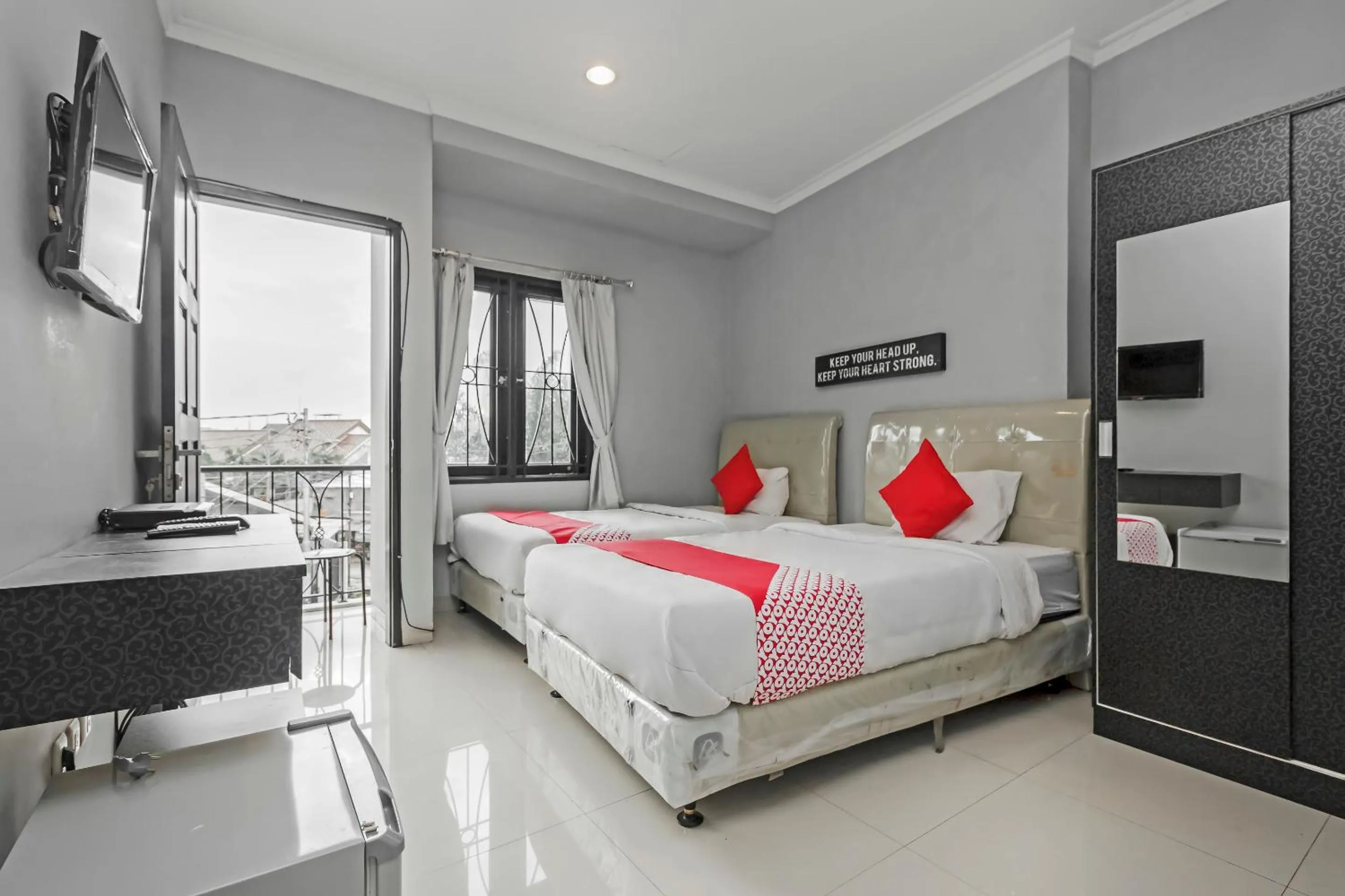 Photo of the whole room, Bed in Collection O Pondok Indah Near Gandaria City Formerly Lamaison Residence