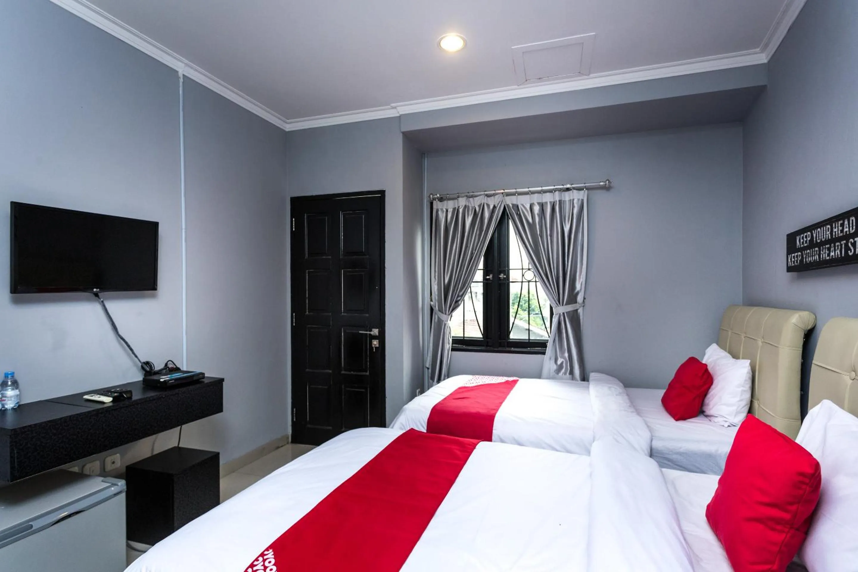 Photo of the whole room, Bed in Collection O Pondok Indah Near Gandaria City Formerly Lamaison Residence