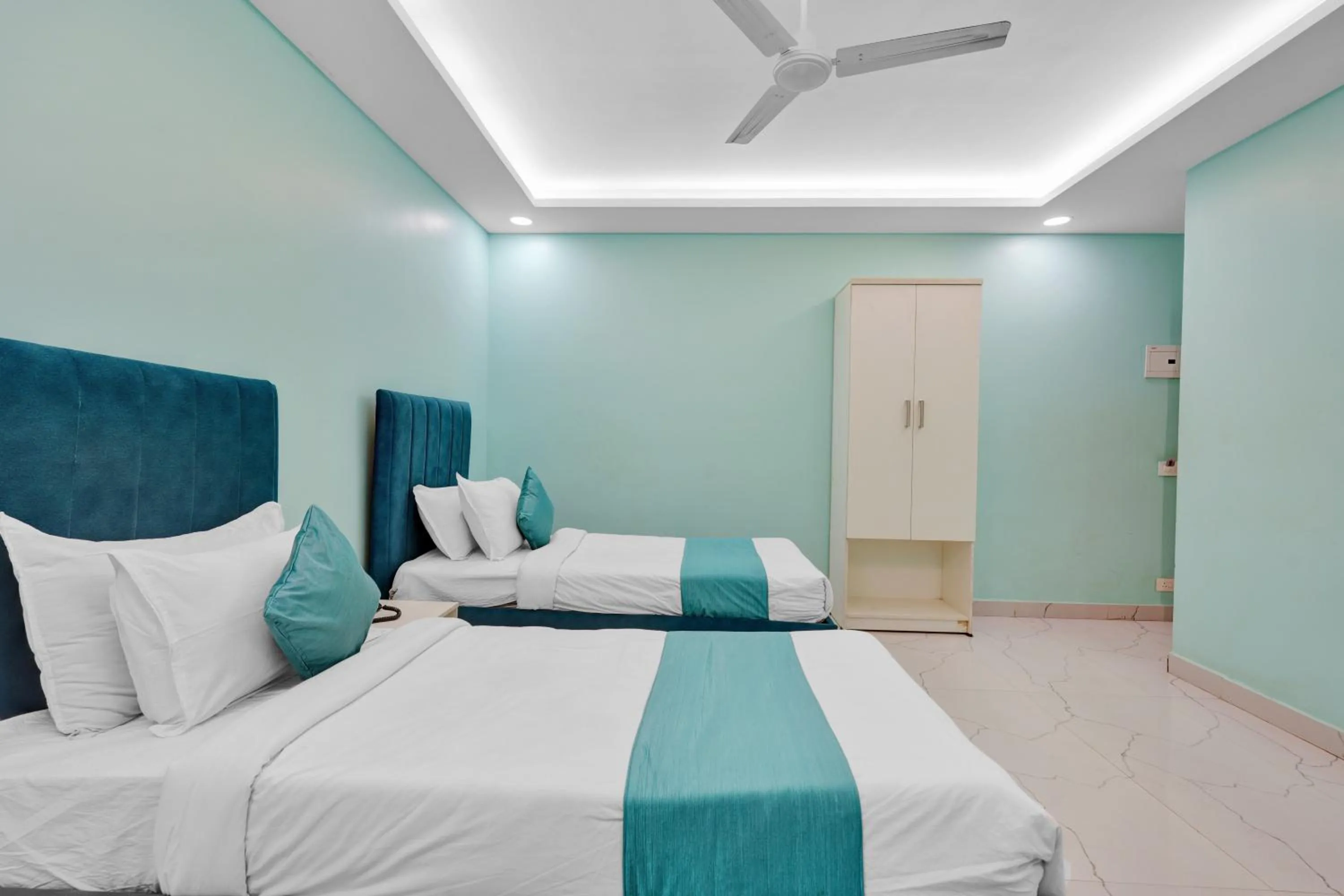 Bed in Rohaan Hotels Medavakkam by UPAR