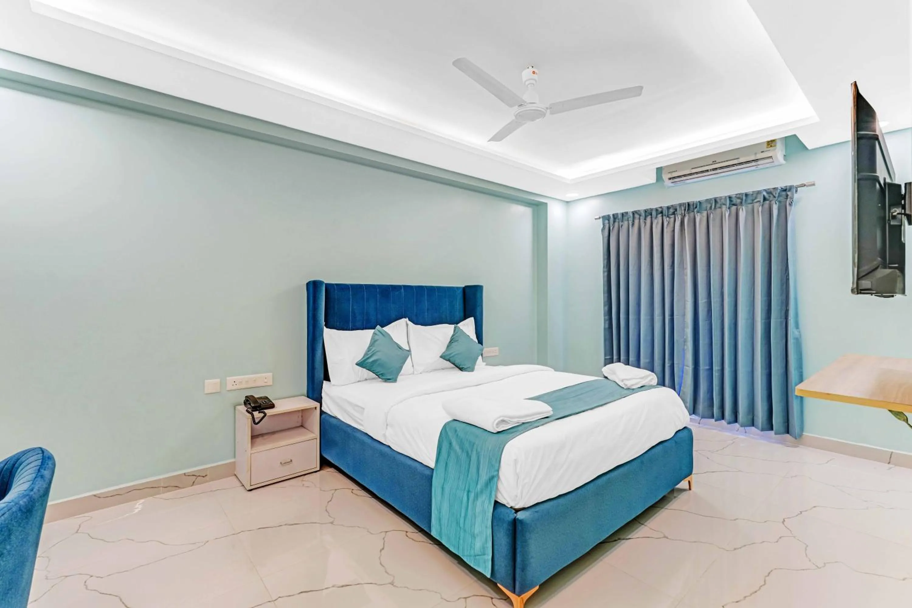 Bed in Rohaan Hotels Medavakkam by UPAR