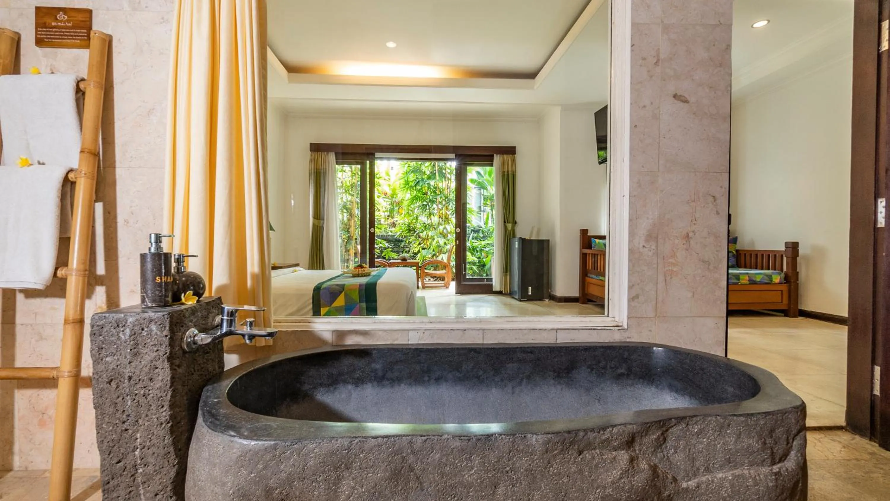 Bedroom in Gita Maha Ubud Hotel by Mahaputra-CHSE Certified