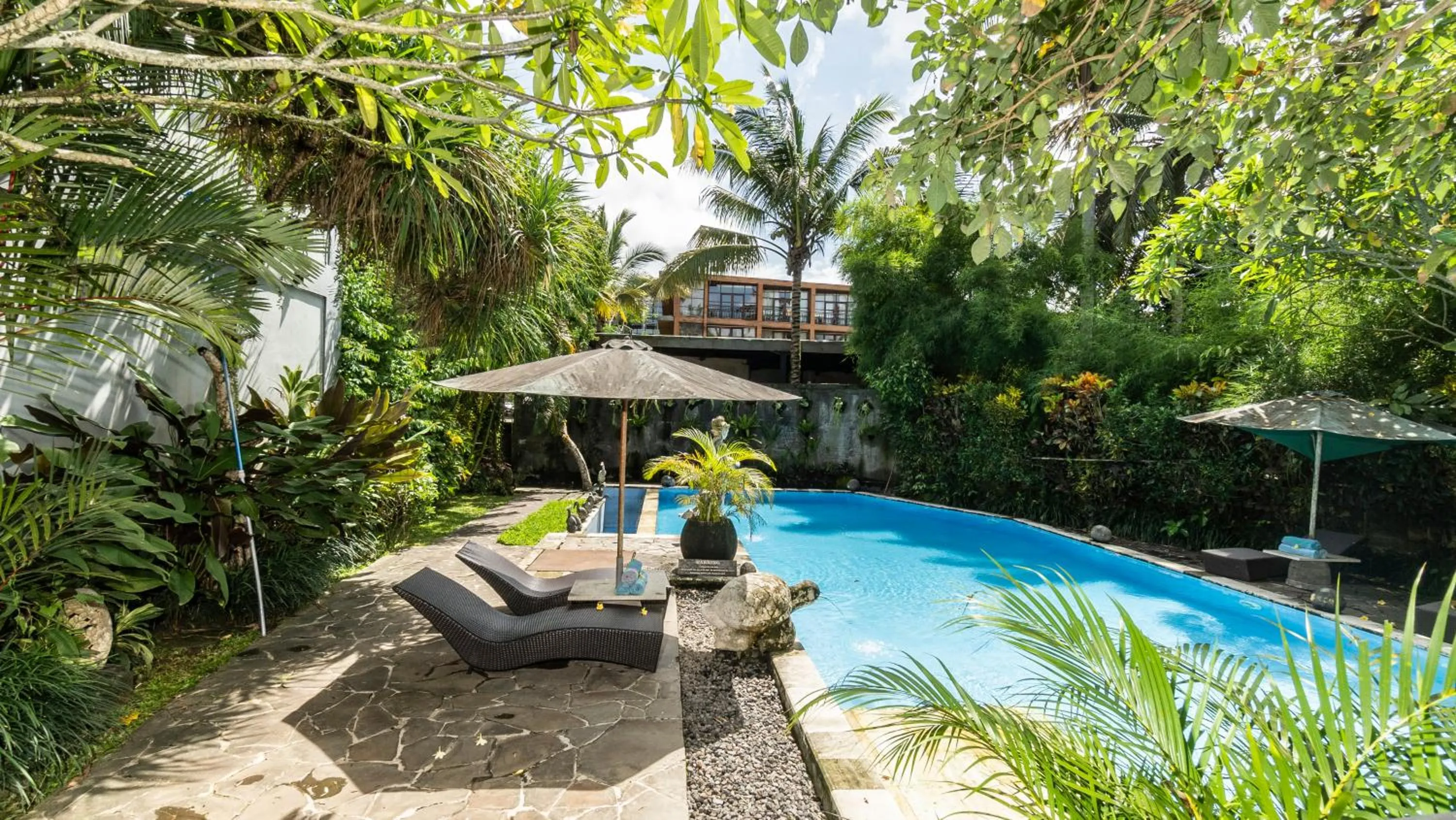 Swimming pool in Gita Maha Ubud Hotel by Mahaputra-CHSE Certified