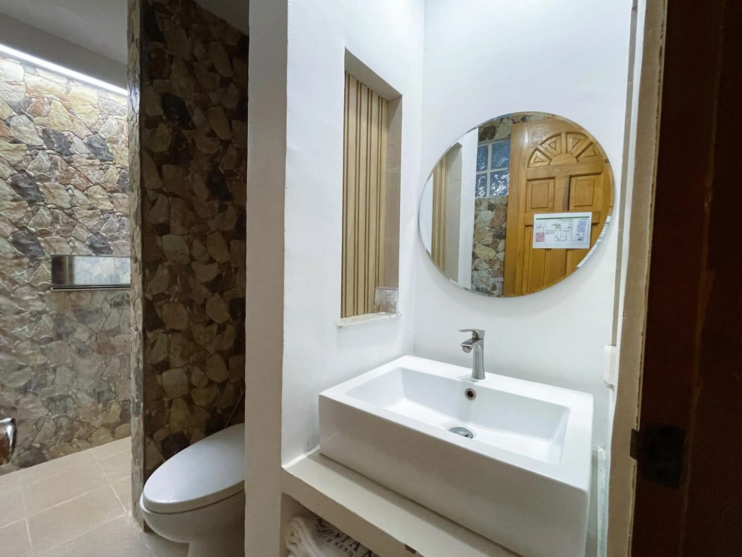 Bathroom in Montani Beach Resort Puerto Galera powered by Cocotel