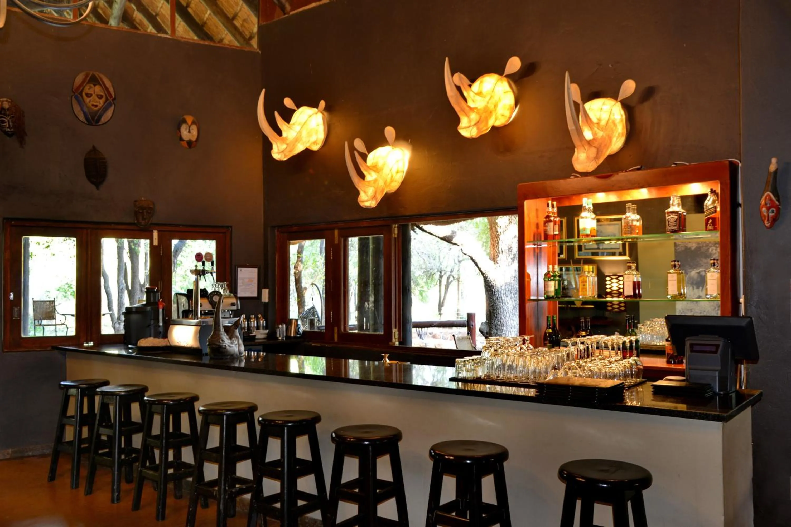 Lounge or bar in Black Rhino Game Lodge