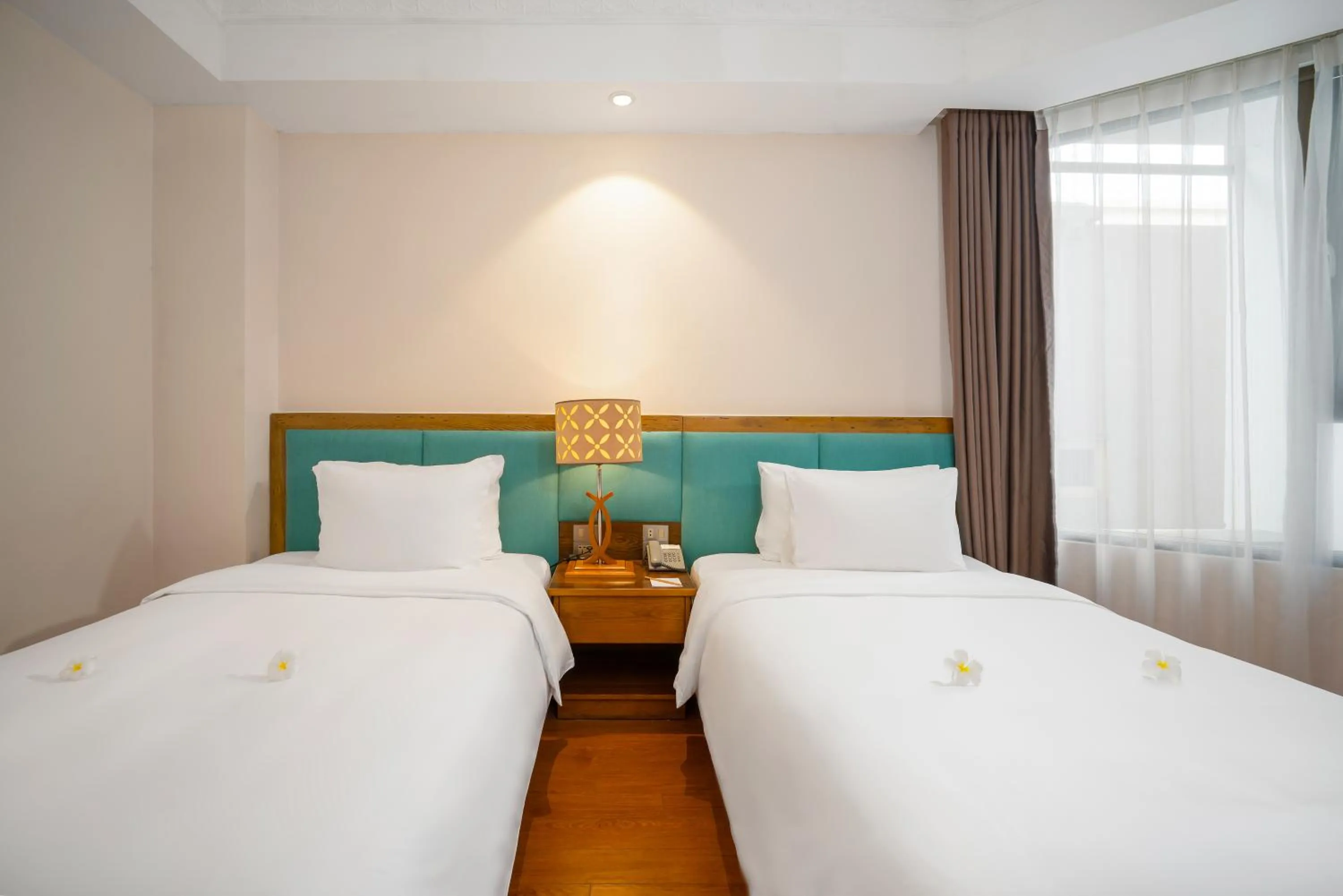 Bed in Diamond Sea Hotel