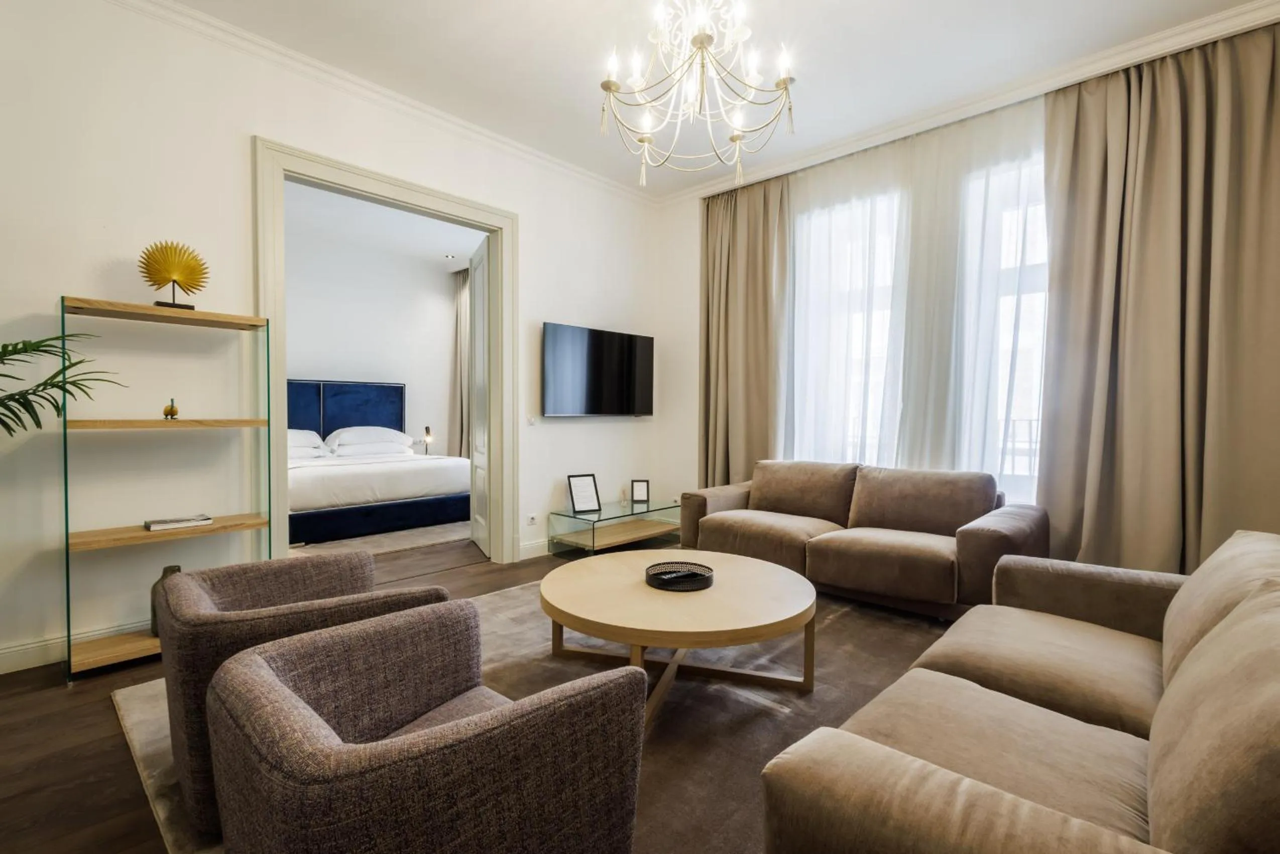 Living room, Bed in Kozmo Residences Budapest