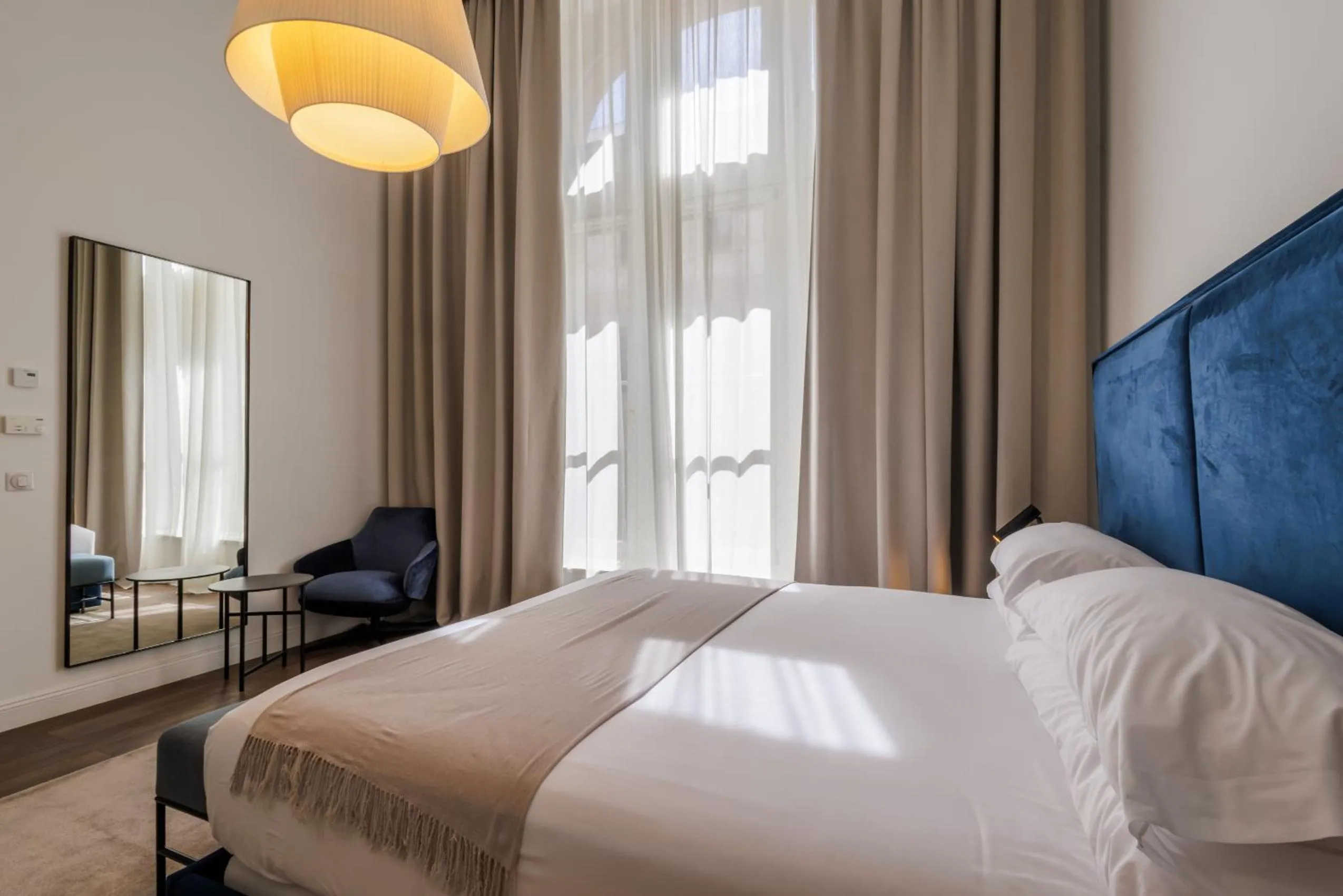 Bed in Kozmo Residences Budapest