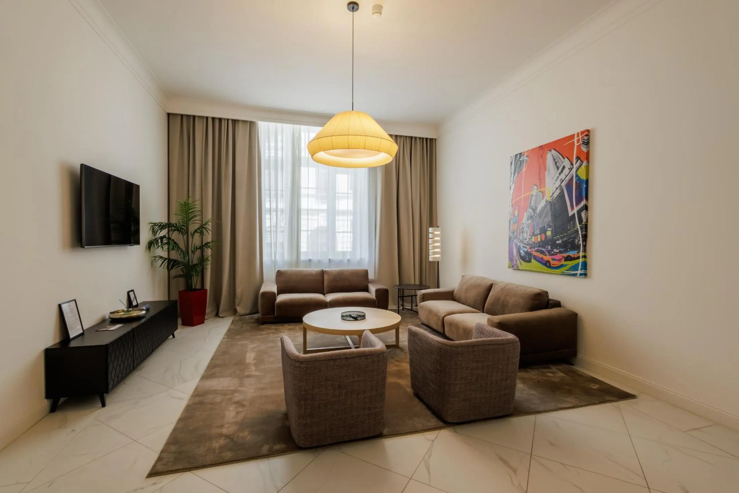 Communal lounge/ TV room in Kozmo Residences Budapest